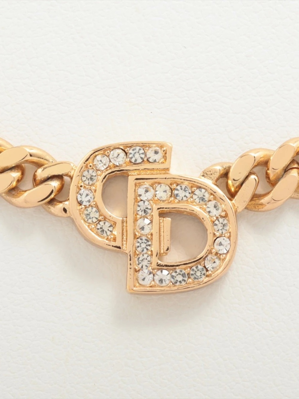 1980s rhinestone-embellished logo gold tone link